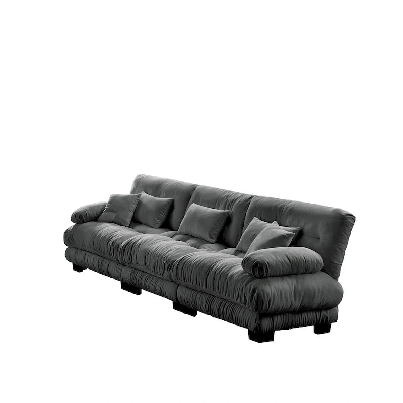 Sofa für vier Personen mit runden Armlehnen und tiefen Sitzkissen