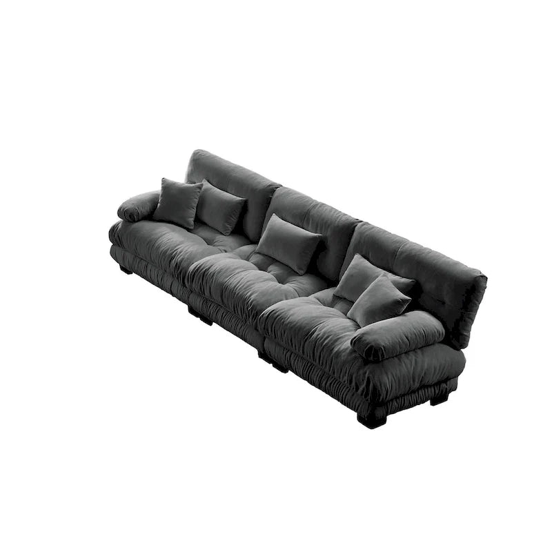Sofa für vier Personen mit runden Armlehnen und tiefen Sitzkissen